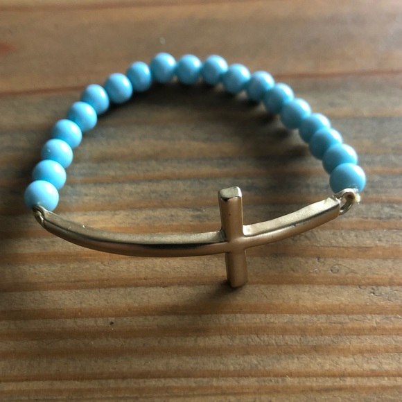 Jewelry - Gold colored cross with light blue beads braclet